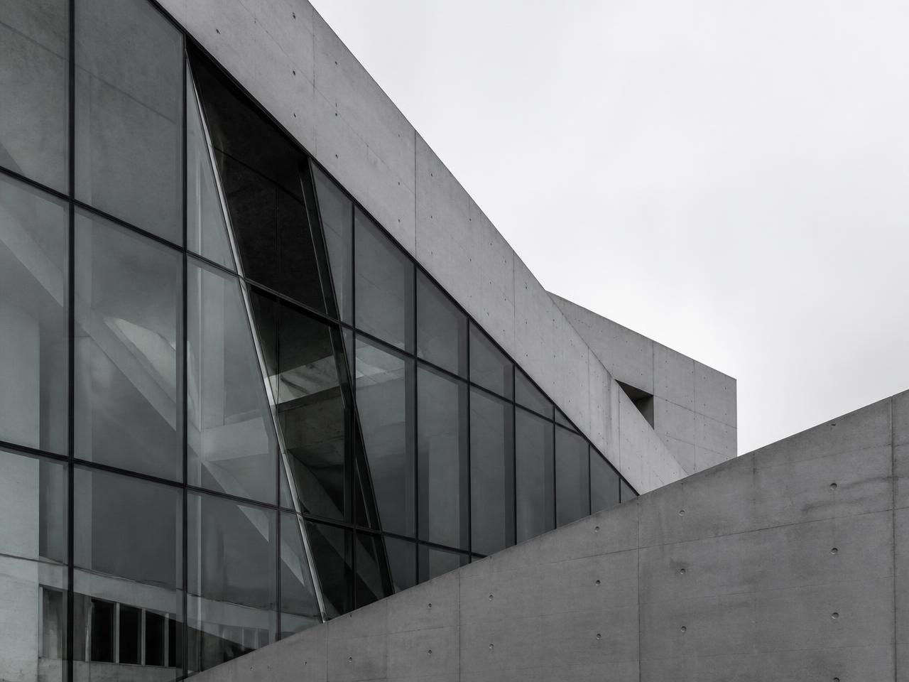 Modern industrial building facade in concrete and glass